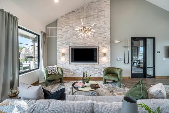 Clubhouse Lounge Area With Mounted Flat Screen TV