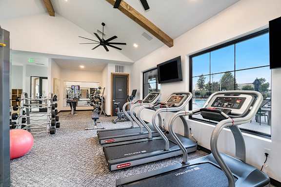 Fitness Center Featuring Cardio & Strength Training Equiipment  & Weights