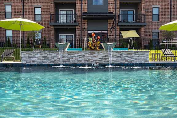 Resort-Style Pool With Fountains