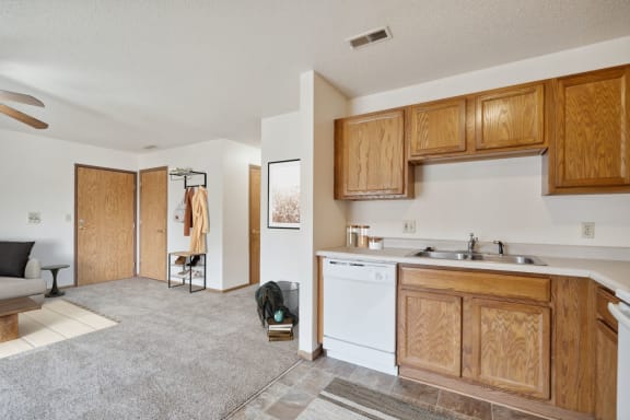 Open Kitchen with Wood Cabinets.