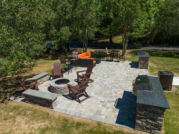 Outdoor Grill, Firepit & Lounge Area On The Patio