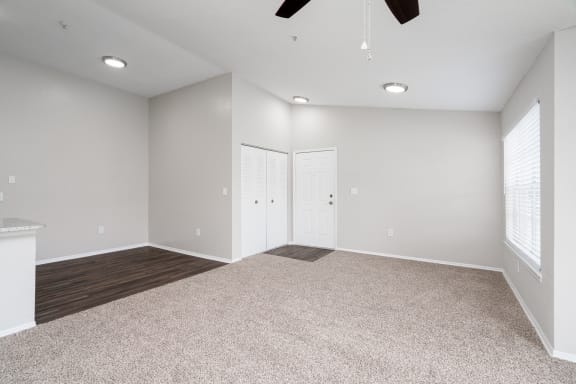 Living Room with High Ceilings and Ceiling Fan