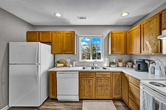 Fully-Equipped Kitchen with Wood Cabinets
