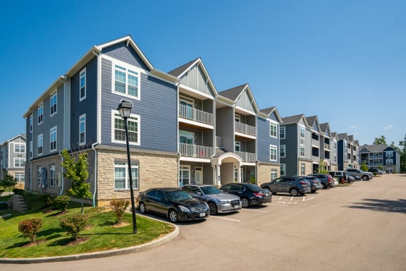 Exterior Of Apartment Homes With Parking In Front