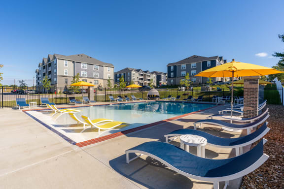 Large Pool Sundeck with lots of Lounge Chair Options