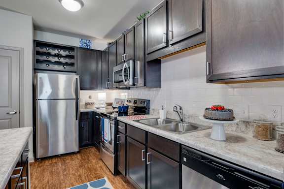 Kitchen With Espresso Cabinets & Brushed Nickel Hardware