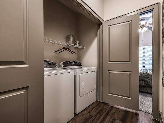 A laundry room with a washer and dryer.
