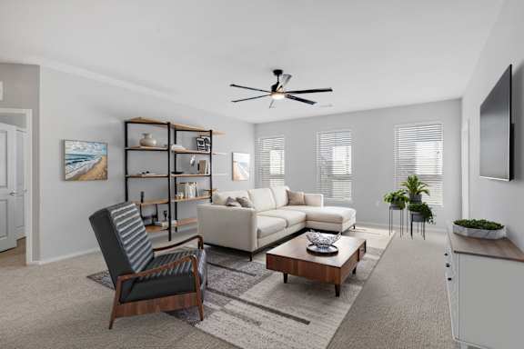 Large Living Room with Plush Carpet and Lots of Natural Light