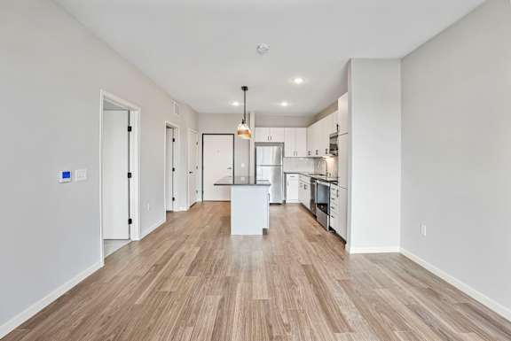 Living Area with Hardwood-Style Floors