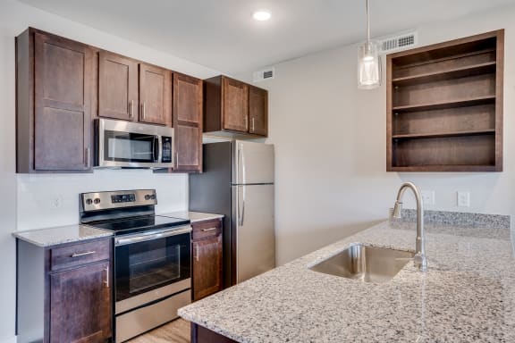 Fully-Equipped Kitchen With Stainless Steel Appliances & Large Island