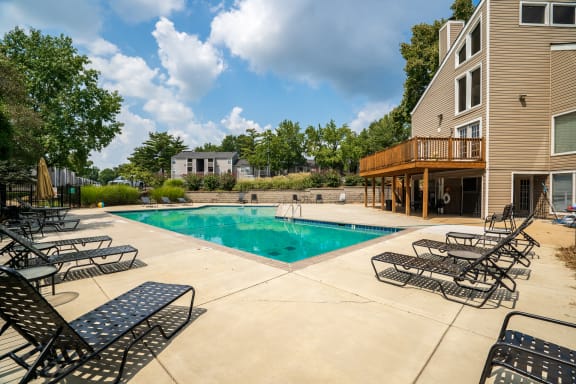 Pool & Sundeck With Lounge Chairs