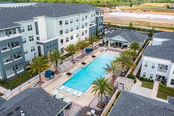 Aerial View of the Expansive Resort-Style Pool & Sundeck
