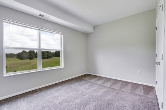 Bedroom With Large Windows