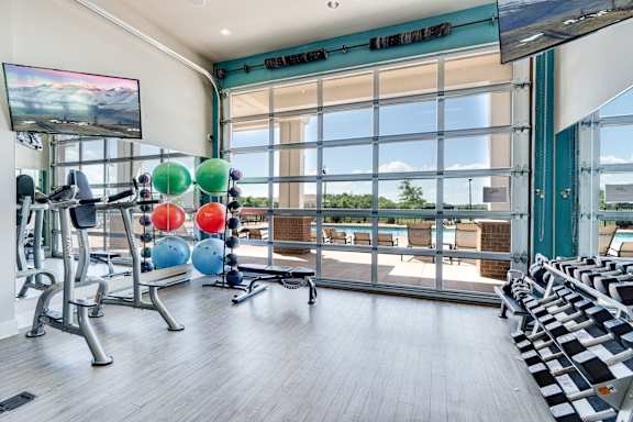 Fitness Center With Glass Garage Door