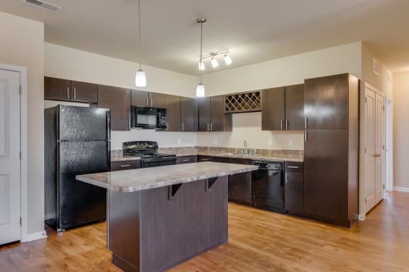 Kitchen With Lots Of Cabinetry & Built-In Wine Rack
