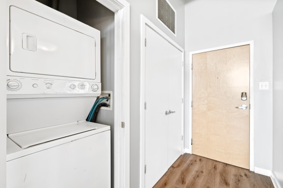 a laundry room with a washer and dryer