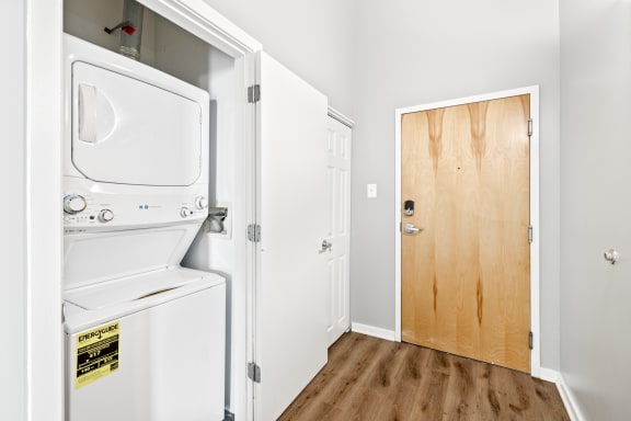 a laundry room with a washer and dryer