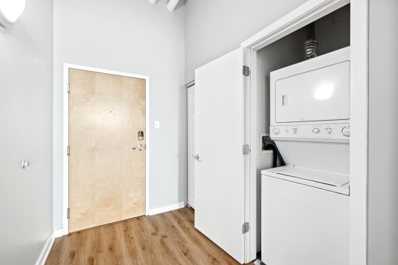 a laundry room with a washer and dryer