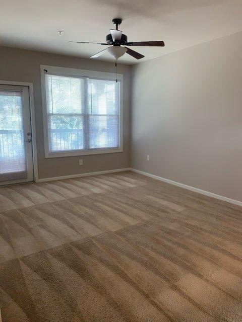 Room with a ceiling fan and carpeted floor at Etiwan Place, Goose Creek, SC 29445