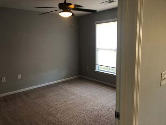 Room with a ceiling fan and a window at Cooper Terrace in 28621