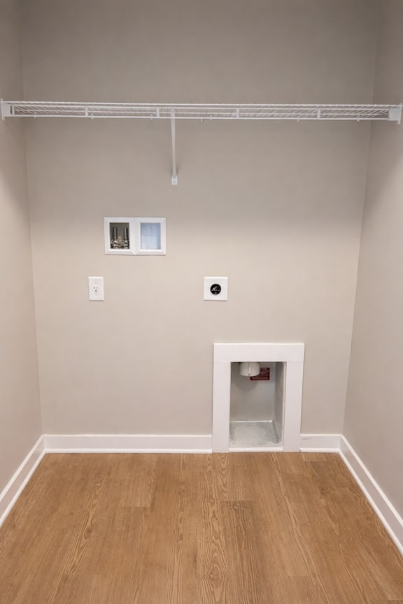 A room with a white door and a white shelf above it.