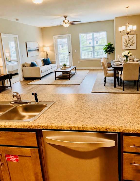 A kitchen with a sink and a countertop.