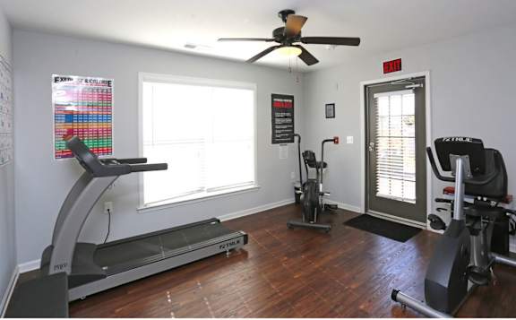 Gm with a treadmill, elliptical trainer, and a stationary bike at Cooper Terrace in Elkin, NC