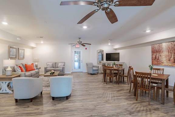 A spacious living room with a dining table and chairs. at Mountain Laurel Apartments, Staunton, VA, 24401