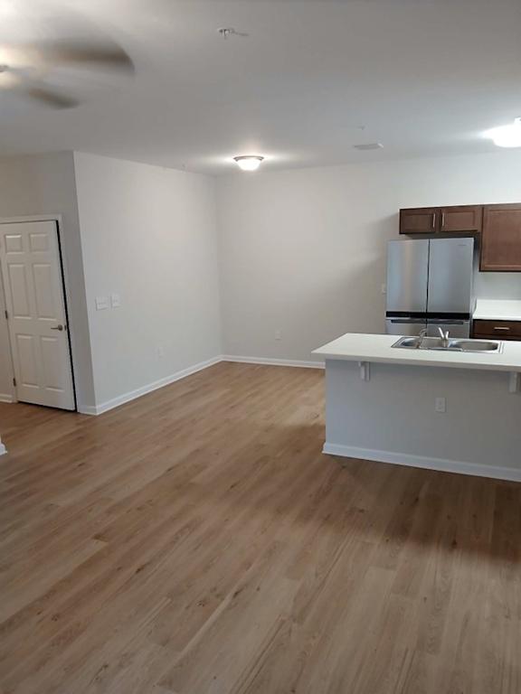 Kitchen with a refrigerator at The Assembly II in Greenville