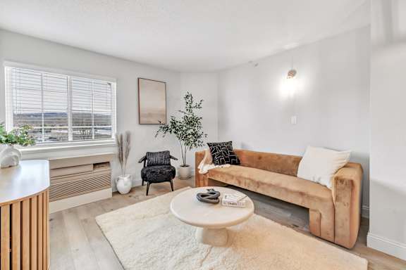 a living room with a couch and a coffee table