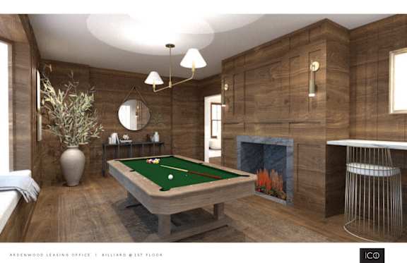a billiards room with a fireplace and a pool table