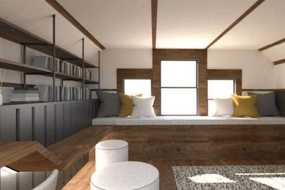 reading nook with a wooden floor and a large window.