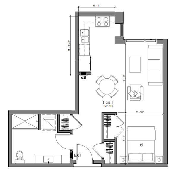 A floor plan of a house with a kitchen, living room, and bathroom.