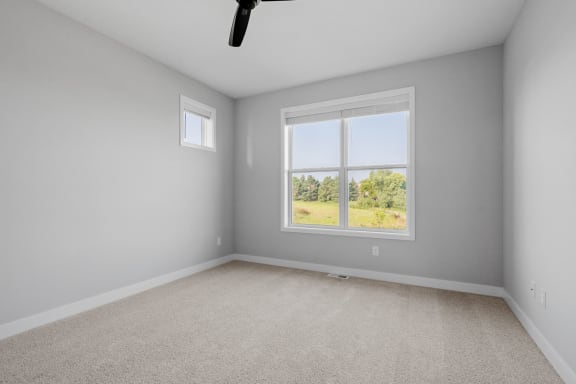 an empty room with a window in it