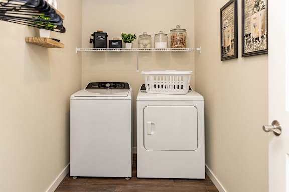 A laundry room with a washer and dryer.