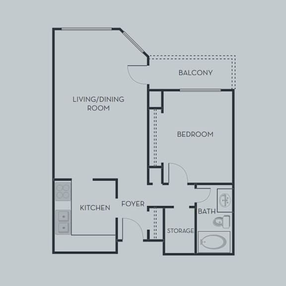 A floor plan of an apartment with a living/dining room, kitchen, foyer, bedroom, bathroom, and storage.