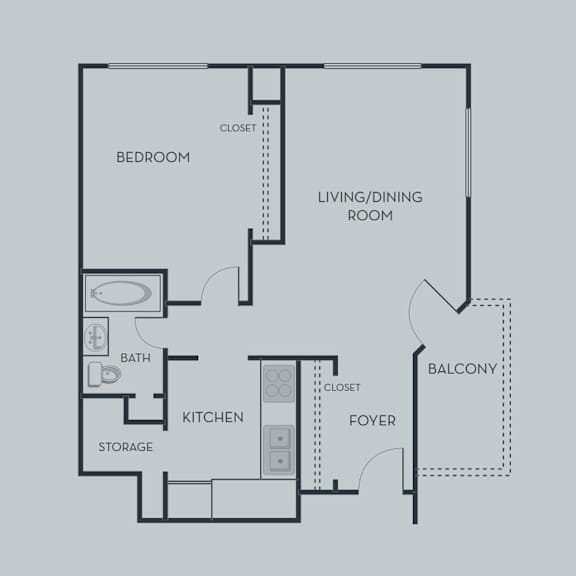 A floor plan of a home with a bedroom, living/dining room, kitchen, and foyer.