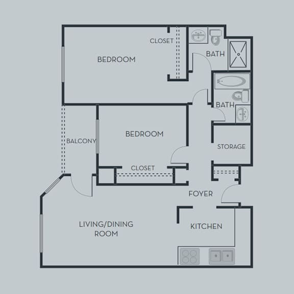 A floor plan of an apartment with two bedrooms, a living/dining room, a kitchen, a foyer, and storage.