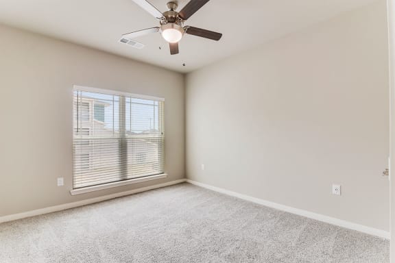 boterra at lago mar apartments ceiling fan with overhead light fixture in bedroom