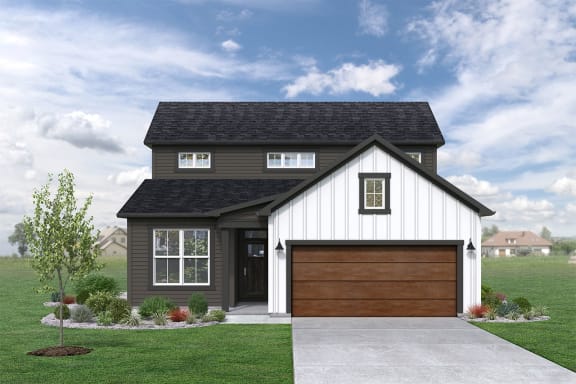 a home with a white and brown exterior and a black and white garage door