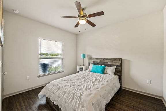 champions gate apartments bedroom with ceiling fan