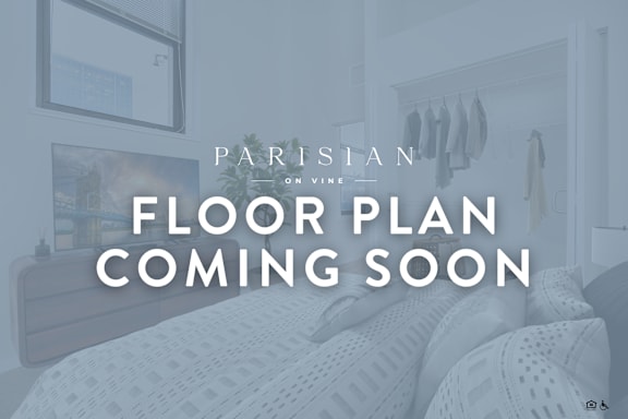 A bedroom with a bed and a sign that says "FLOOR PLAN COMING SOON".