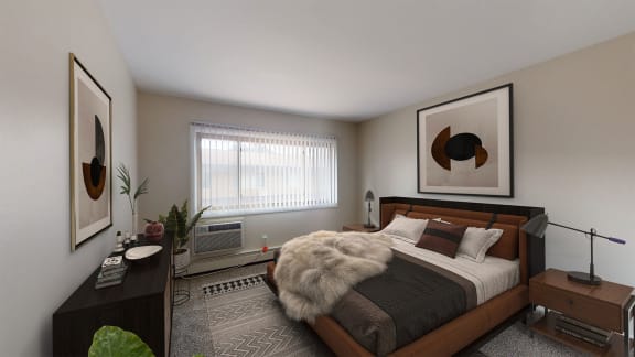 a bedroom with a bed in a room