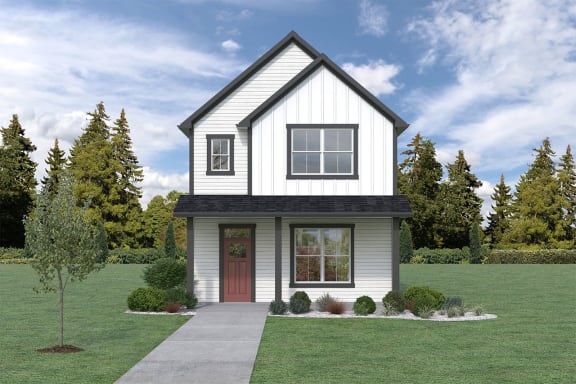 a home with white siding and a red door