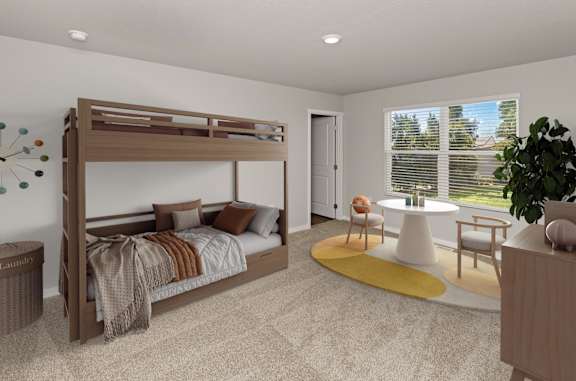 A bedroom with a large bed and a yellow rug.