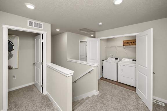 Laundry room with washer and dryer.
