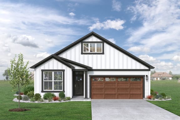 a home with a white siding and a brown garage door