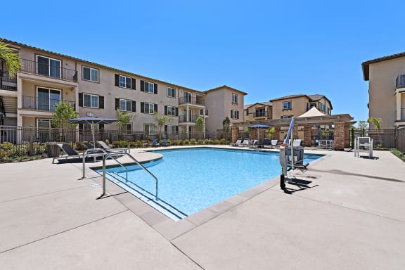 Blue Cool Swimming Pool at LEVANTE APARTMENT HOMES, Fontana, CA, 92335