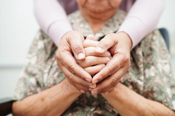 a woman holding the hands of an elderly woman royalty free adult stock illustration