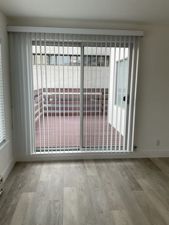 an empty room with a large window